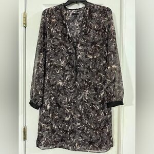 The brand is Ann Taylor, it is size 4, rhe color is brown.